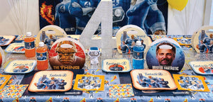 Fantastic Four character dessert plates featuring The Thing, Invisible Woman, Human Torch, and Mister Fantastic with signature phrases and retro comic styling.