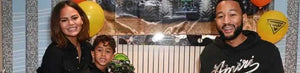 John Legend and Chrissy Teigen celebrating their son's 6th birthday in a Monster Jam-themed suite at the World Finals at SoFi Stadium