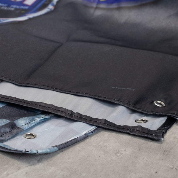 Close up of the fabric and grommets of the NASCAR Fabric Wall Banner by Prime Party