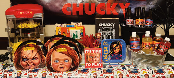 Panoramic view of a Chucky movie night concession stand set beneath a Chucky wall banner