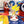 Sonic the Hedgehog figurine with drinks and promotional items on a table