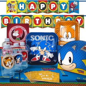 Classic Sonic deluxe party pack with Sonic dinner plates, Tails dessert plates, napkins, bottle labels, table cover, Happy Birthday banner, and Sonic favor boxes.