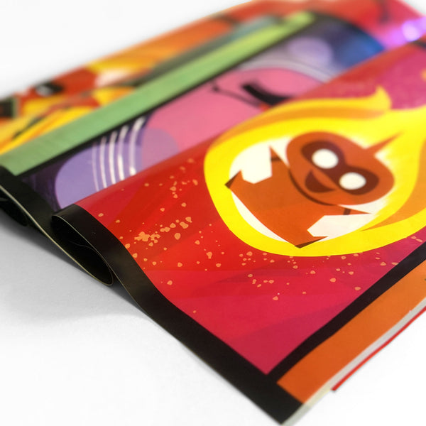 Incredibles 2 table cover shown on a rectangular party table